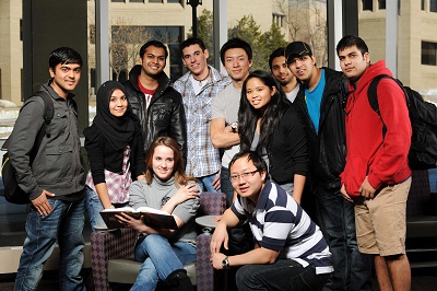 Students gathered in front of a building